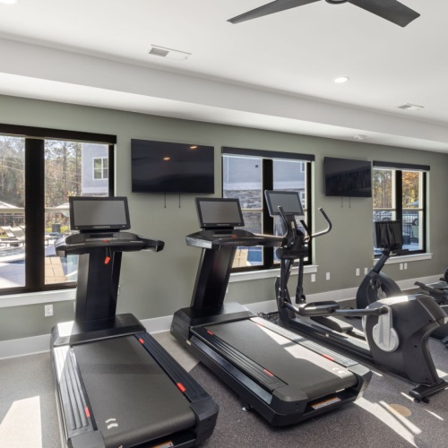 Quick access to state-of-the-art amenities fitness studio with exercise equipment